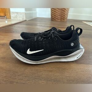 Nike Women’s Black Running Shoes with White Swoosh